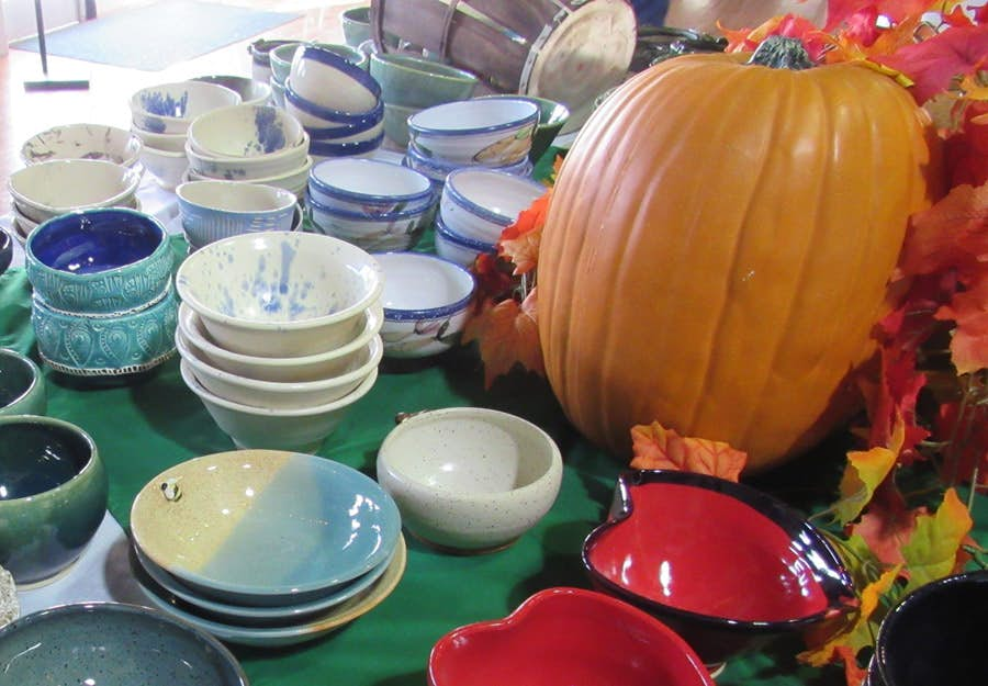 Table with soup bowls on top